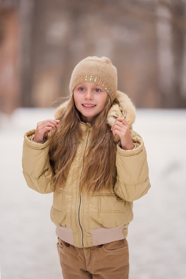 Portrait of Happy Russian Little Girl in on Background of Melting Snow ...