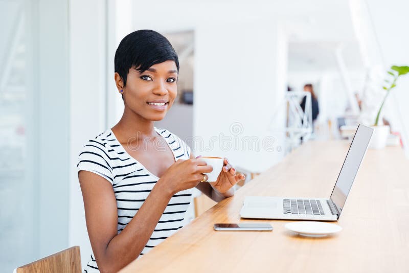 Portrait of a Happy Smiling African Businesswoman Using Laptop Stock ...
