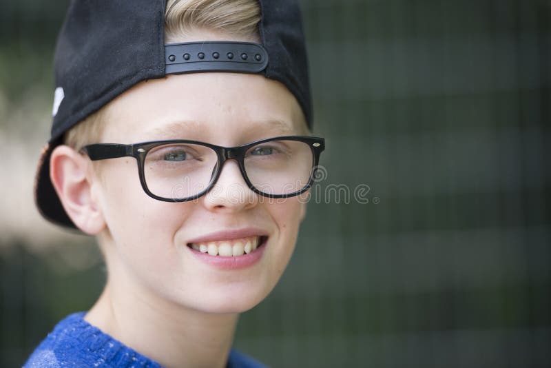 Portrait happy smiling teenage boy