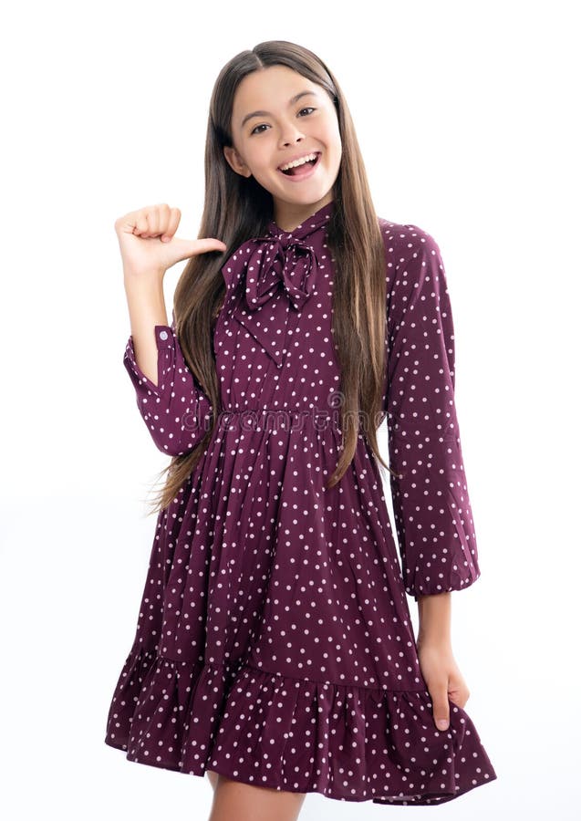 Portrait of happy smiling teenage child girl. Teenager child girl point thumb herself. Choose me. Girl pointing at