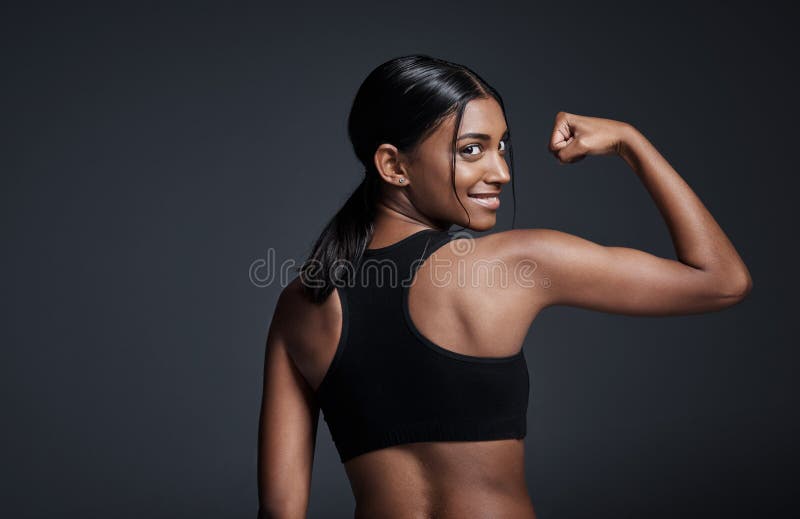 292 Lady Flexing Bicep Stock Photos - Free & Royalty-Free Stock Photos from  Dreamstime