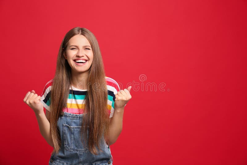 Portrait of happy woman on red background royalty free stock images