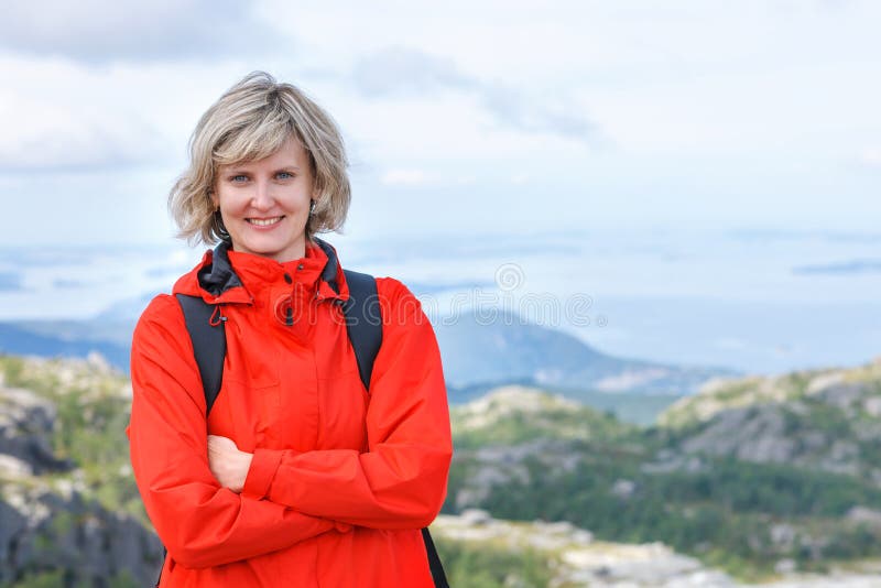 Portrait of happy woman tourist standing smiling outdoors royalty free stock photos Portrait of happy woman tourist standing smiling outdoors royalty free stock photos
