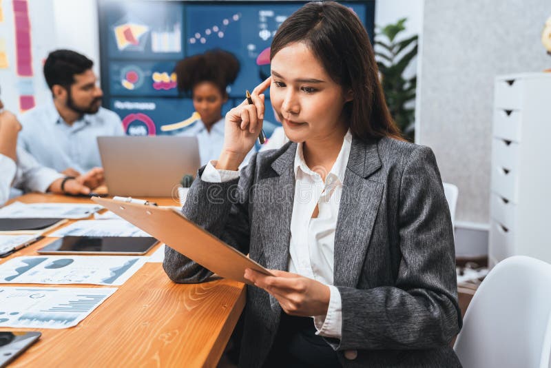 Portrait of happy young asian businesswoman with in office meeting. Concord stock photography