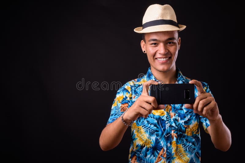 Portrait of Happy Young Indian Tourist Man Taking Picture with Phone ...