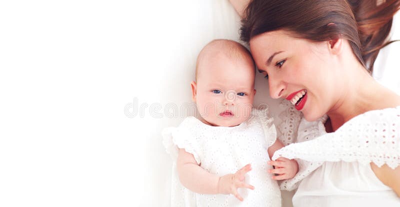 Portrait of happy young mother with infant baby girl, daughter