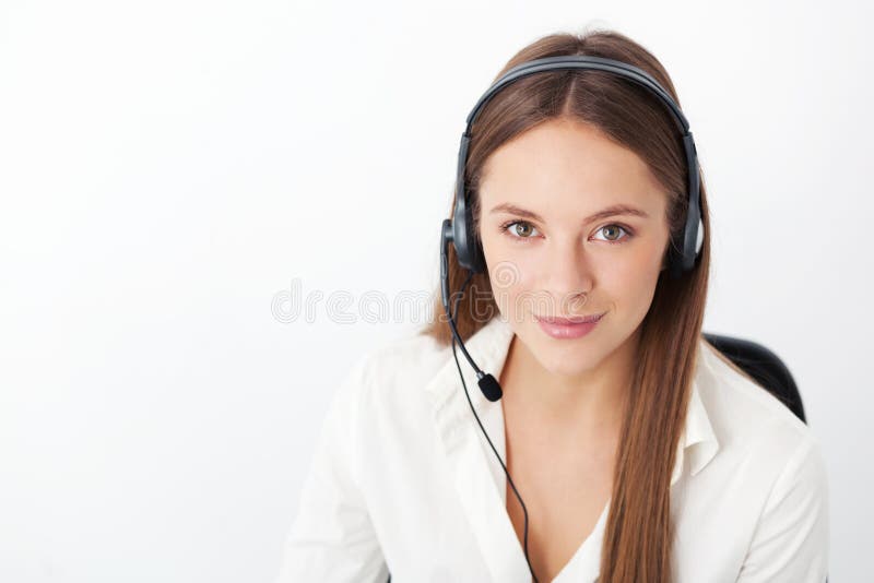 Portrait of happy cheerful beautiful young support phone operator with headset. Portrait of happy cheerful beautiful young support phone operator with headset.