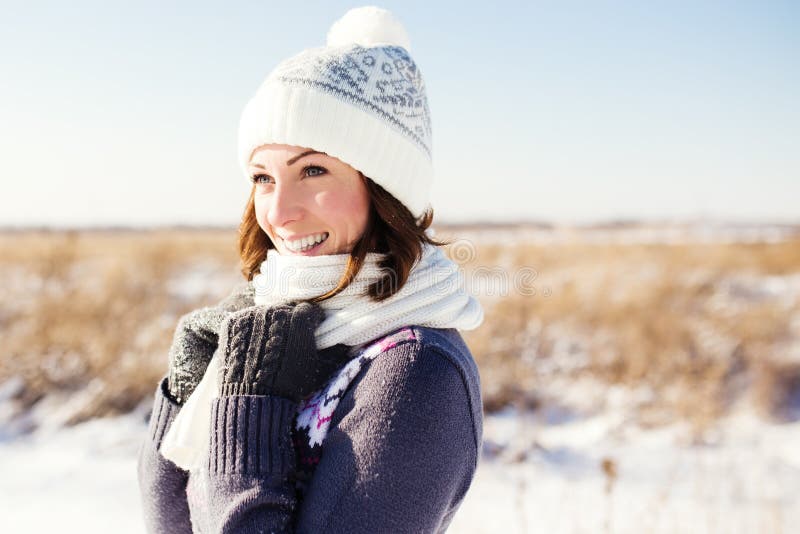 Portrait of happy young woman have fun at winter