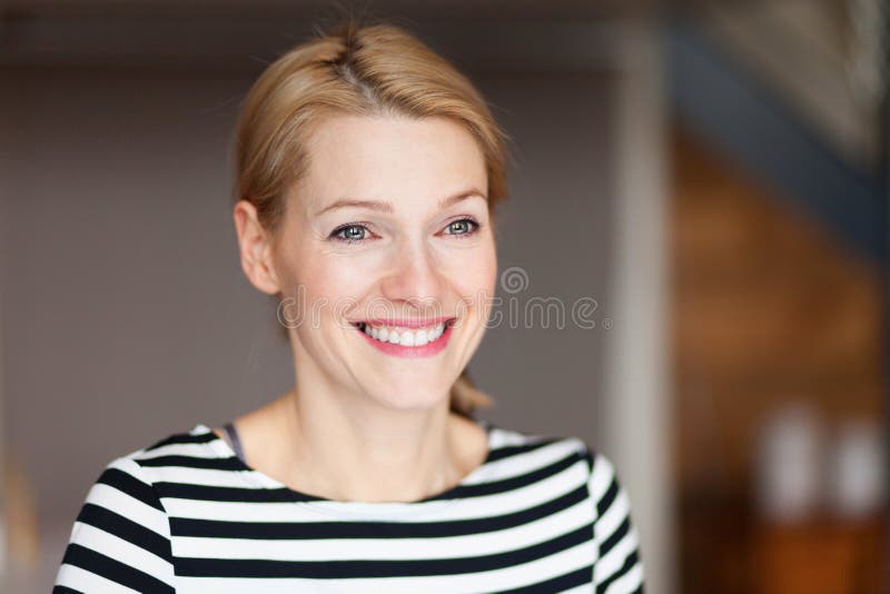 Portrait of a happy young woman looking away. She smiling. stock images Portrait of a happy young woman looking away. She smiling. stock images