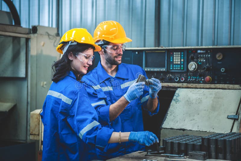 Portrait of Heavy Industry Workers Working on the Metal Fabrication