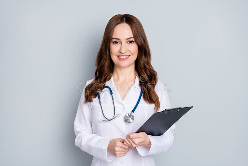 Portrait of her she nice attractive cheerful cheery kind wavy-haired doc phonendoscope stethoscope signing contract stock photo Portrait of her she nice attractive cheerful cheery kind wavy-haired doc phonendoscope stethoscope signing contract stock photo