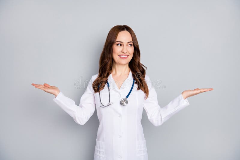 Portrait of her she nice attractive cheerful wavy-haired doc holding copy space on palm advert choose choice decision stock photos Portrait of her she nice attractive cheerful wavy-haired doc holding copy space on palm advert choose choice decision stock photos