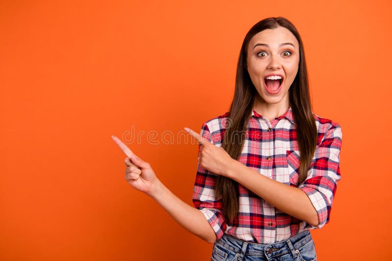 Portrait of her she nice attractive crazy overjoyed cheerful straight-haired girl pointing two forefingers aside great.