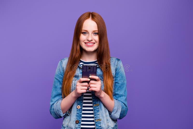 Portrait of her she nice-looking attractive charming cute lovely cheerful straight-haired lady holding in hands new