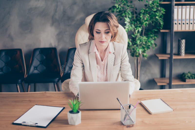 Portrait of her she nice-looking attractive charming stylish trendy focused mature lady working on new project start-up