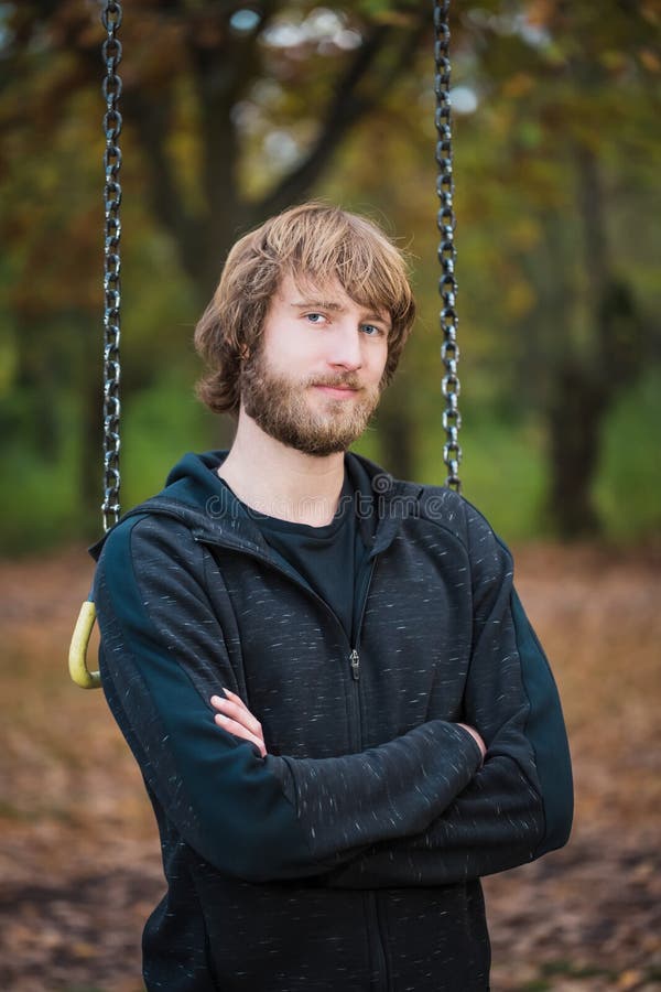 Portrait of an hipster sportive young man in the park royalty free stock photography Portrait of an hipster sportive young man in the park royalty free stock photography