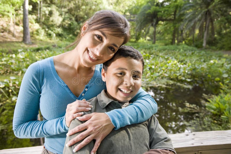 Portrait of Hispanic mother and son outdoors