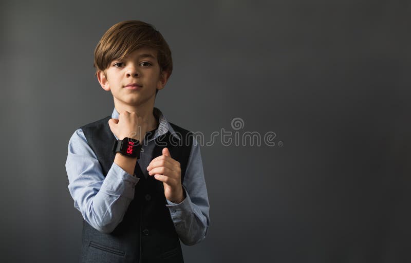 Portrait Image of a Little Boy with a Wrist Watch Stock Photo Image