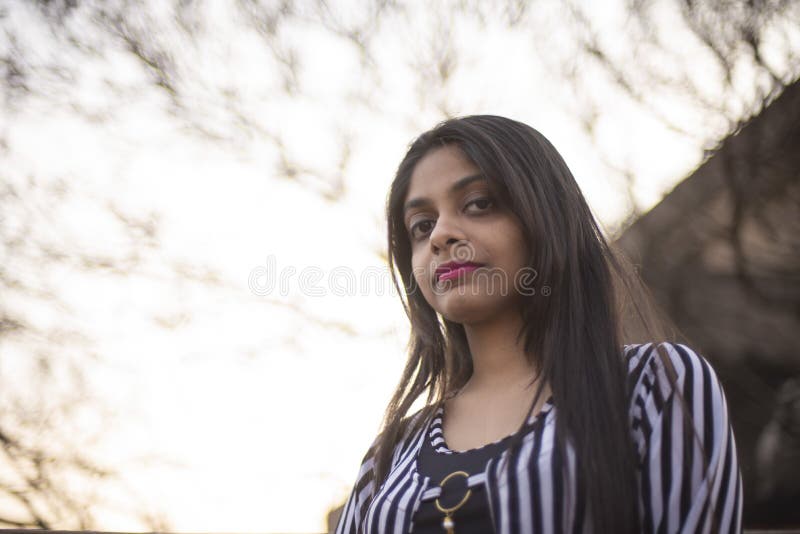 Portrait of Indian Bengali Brunette Girl in Striped Semi Formal Wear Standing on a Rooftop Stock Image - Image of city, lifestyle: 171048181 Portrait of Indian Bengali Brunette Girl in Striped Semi Formal Wear Standing on a Rooftop Stock Image - Image of city, lifestyle: 171048181