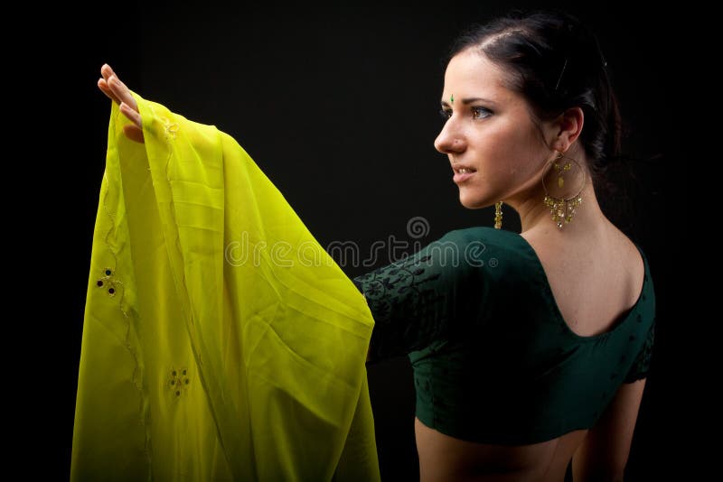 Lady rising her hand in sari. Lady rising her hand in sari