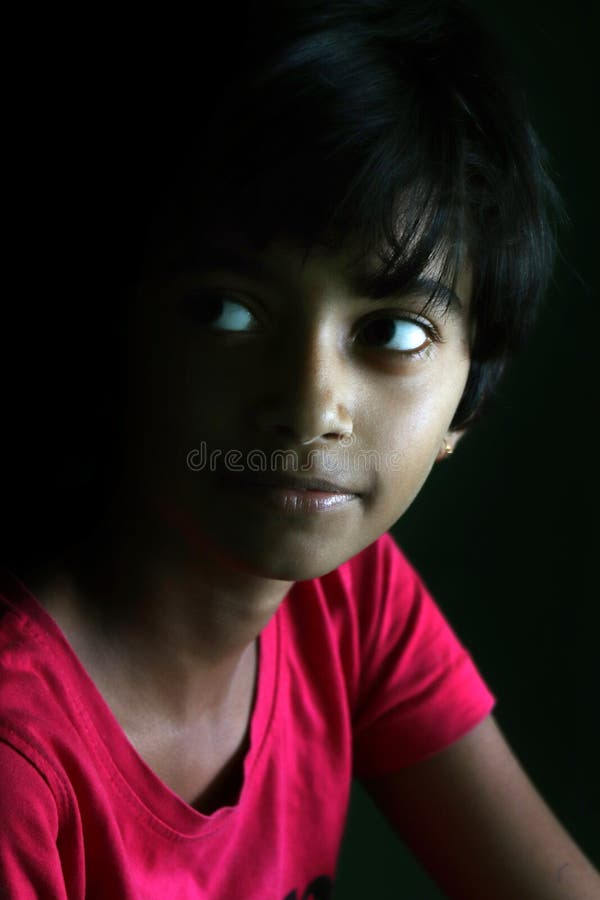 Portrait of an Indian Little Girl with Short Hair. Beautiful Eye of a Child  on Black Background Stock Image - Image of attractive, ethnicity: 180610287