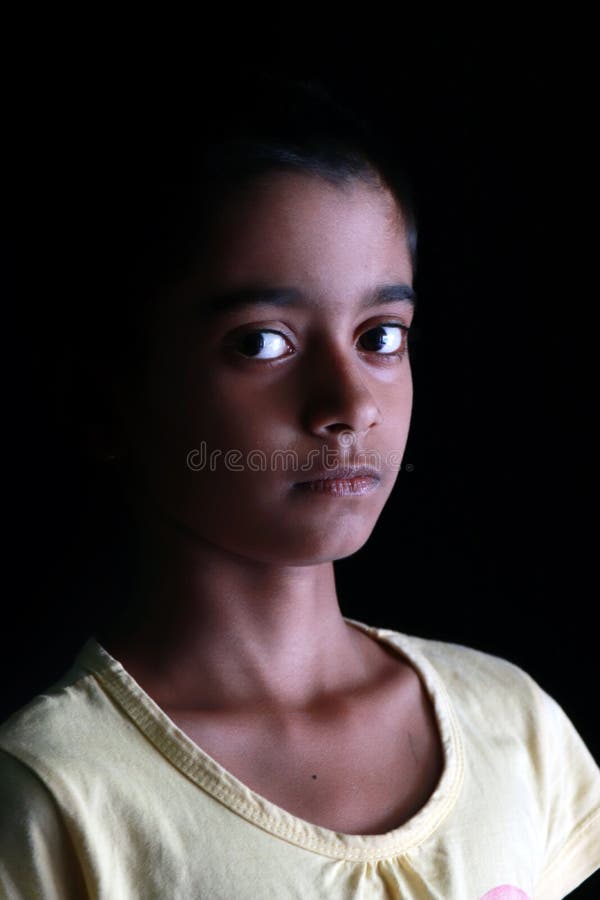 Portrait of an Indian Little Girl with Short Hair. Beautiful Eye of a Child  on Black Background Stock Image - Image of attractive, ethnicity: 180610287