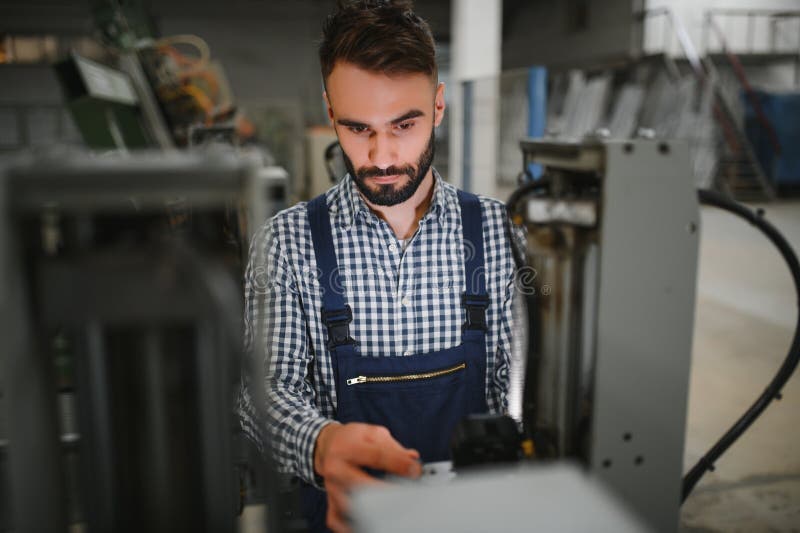 Portrait of Industrial Engineer. Factory Worker with Hard Hat Standing