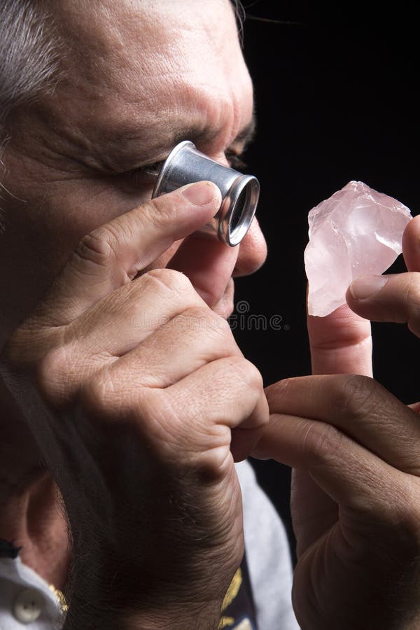 Portrait of a jeweler during the evaluation of jewels. stock photography Portrait of a jeweler during the evaluation of jewels. stock photography