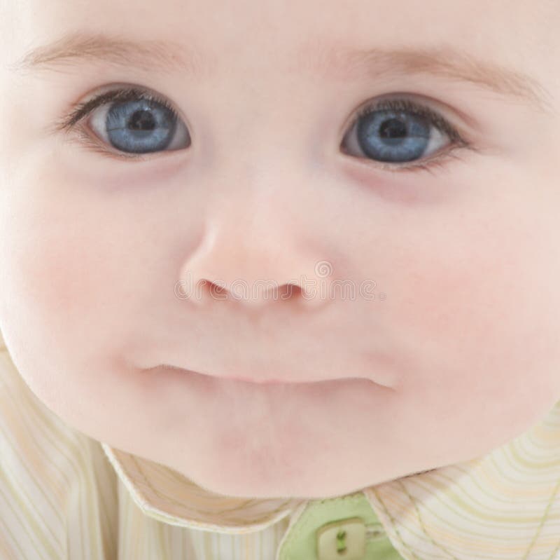 Portrait of joyful blue-eyes baby boy