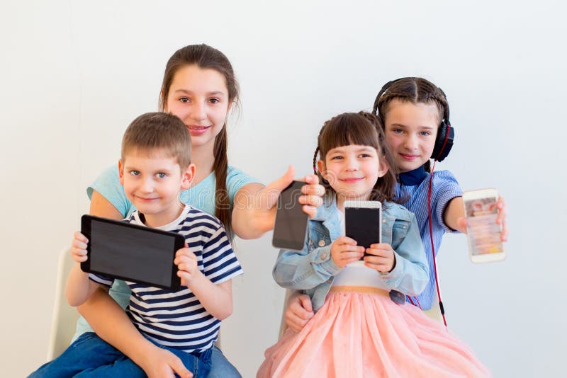 Kids Using Different Gadgets Stock Image - Image of cute, child: 114618655