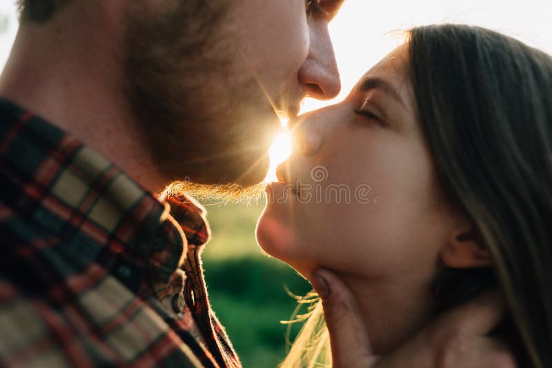 Portrait of Kissing Couple of Lovers Guy with Beard and Brunette Girl at Sunset Sunlight. Close-up of a Young Family Stock Photo - Image of family, holding: 221836620 Portrait of Kissing Couple of Lovers Guy with Beard and Brunette Girl at Sunset Sunlight. Close-up of a Young Family Stock Photo - Image of family, holding: 221836620