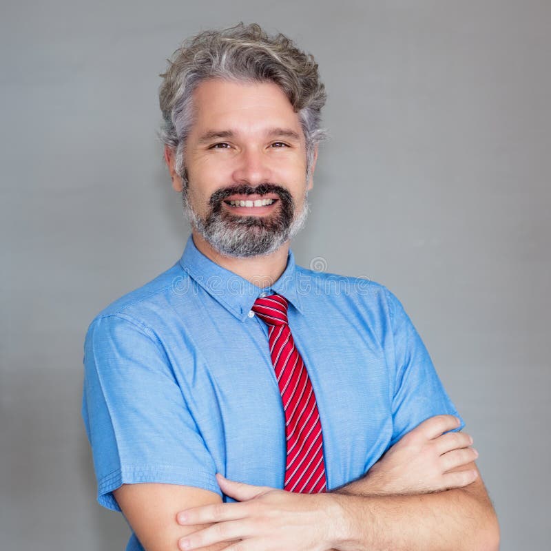 Portrait of laughing mature businessman with beard stock photos Portrait of laughing mature businessman with beard stock photos
