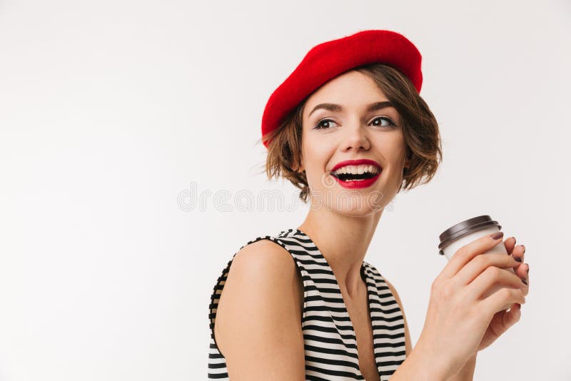 Portrait of a laughing woman wearing red beret