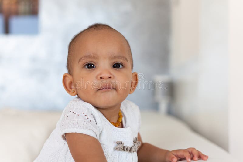 Portrait of little African American little girl smiling - Black