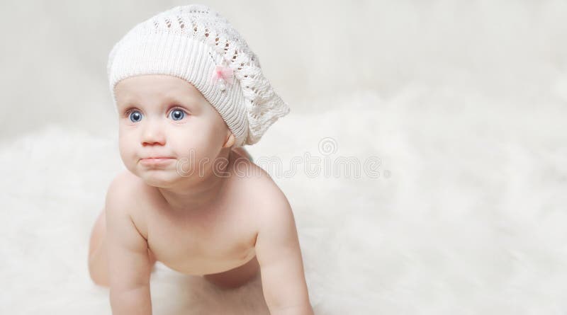 Portrait of a little baby with a hat