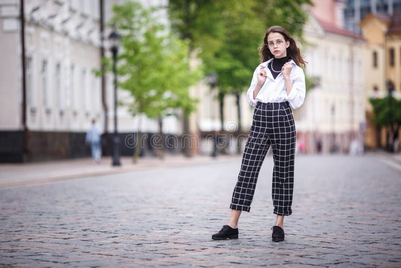 Trendy women black and white plaid pants for women.