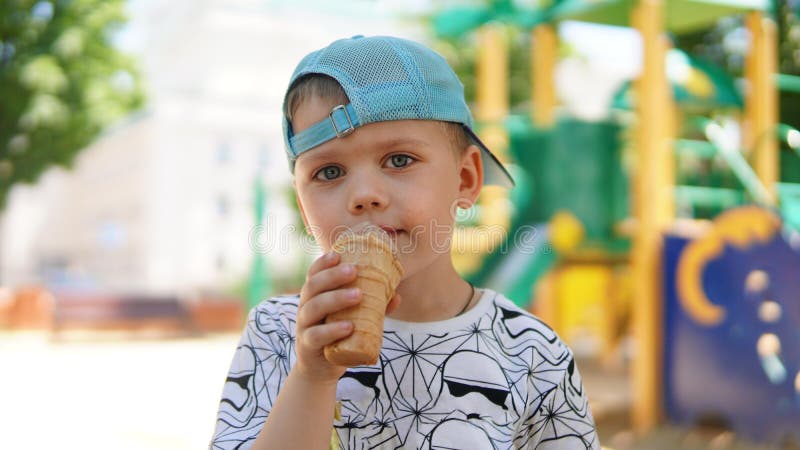 Portrait of a little boy . A child in the Park with funny expresion stock photo Portrait of a little boy . A child in the Park with funny expresion stock photo