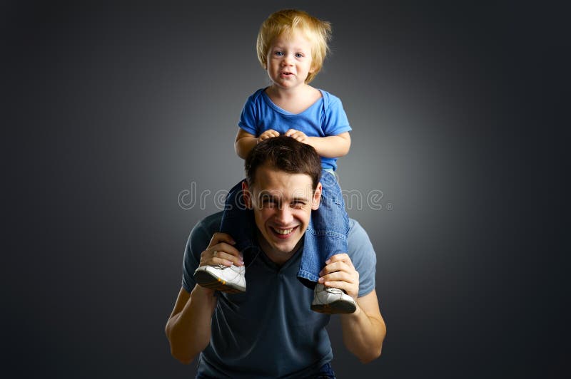 The portrait of a little boy and his father