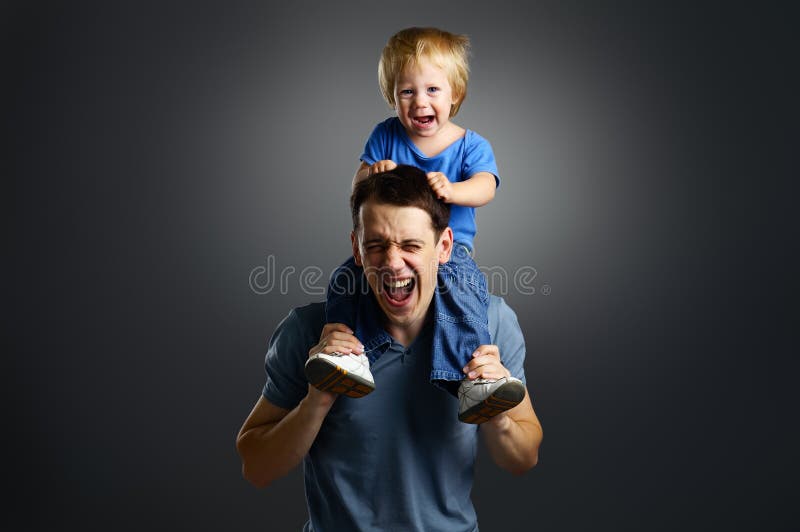 The portrait of a little boy and his father