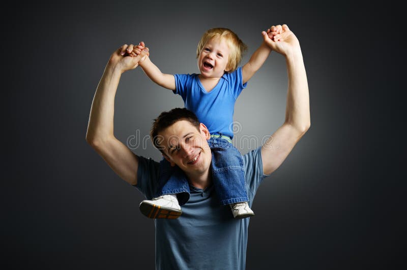 The portrait of a little boy and his father