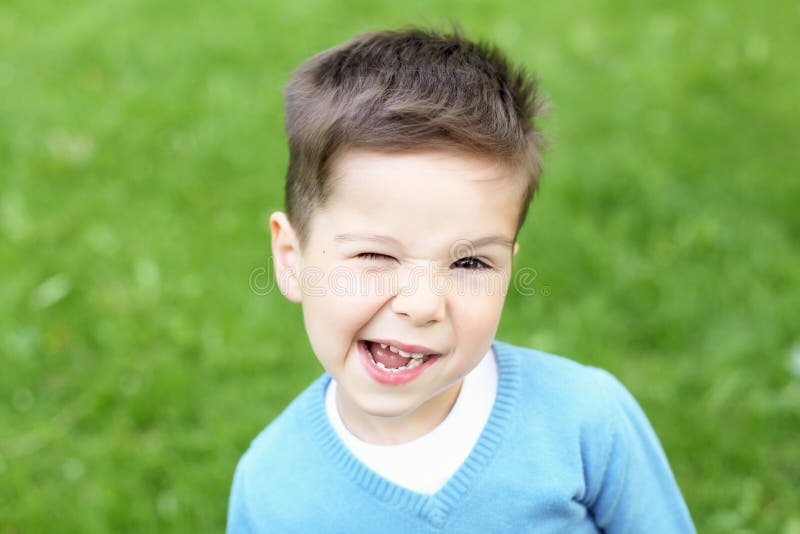 Portrait of a little boy outdoors