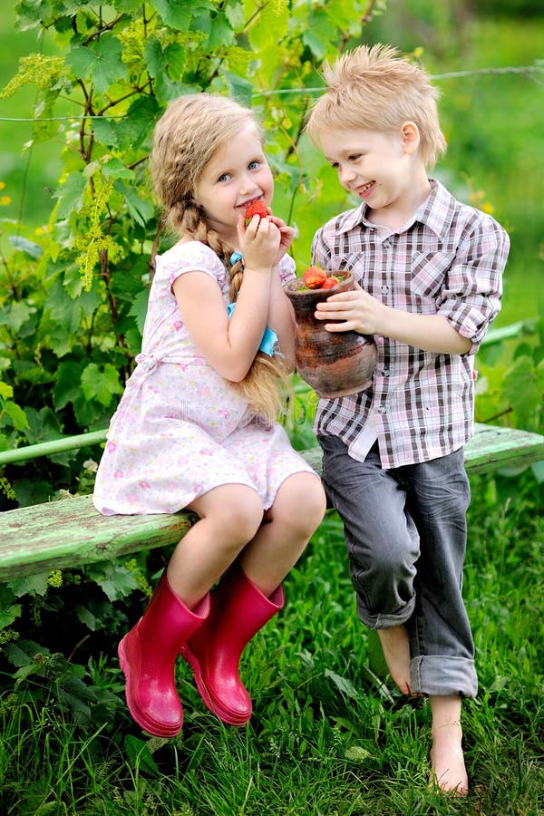 Portrait of Little Boys and Girls Stock Photo - Image of strawberry, outdoor: 27913828