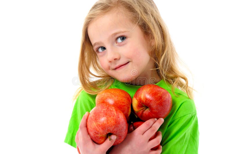 Portrait of little girl with apples