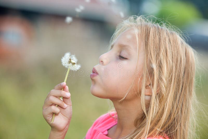 Girl with dandelion