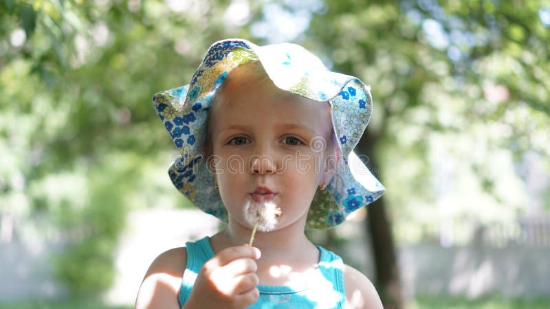 Portrait of little girl with dandelion in the park royalty free stock photography Portrait of little girl with dandelion in the park royalty free stock photography