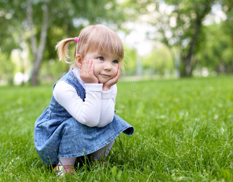 Portrait of a little girl outdoors