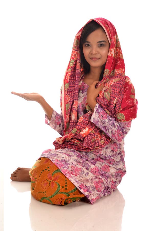 Portrait of a malay woman with kebaya on white background