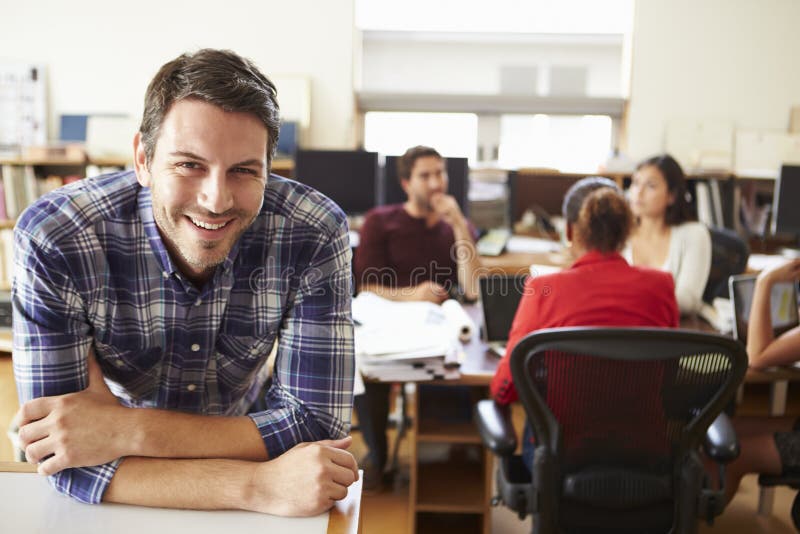 Portrait Of Male Architect With Meeting In Background royalty free stock image