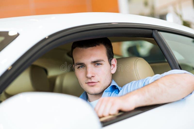 Portrait of a man in a car