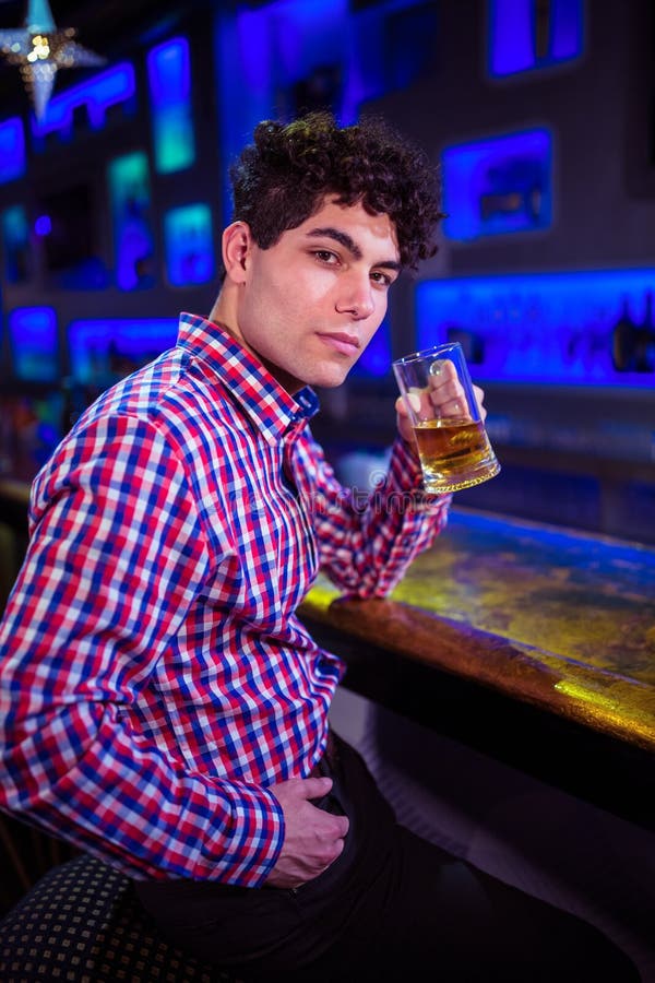 Portrait of man drinking beer stock photos